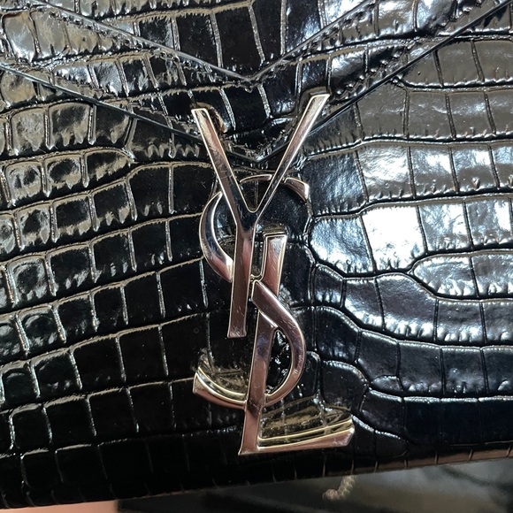 YSL Cassandra
Very very good condition only tried on once
Black, Leather - Picture 3 of 5